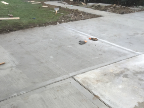 New concrete driveway installation by ODC Construction New concrete driveway installation by ODC Construction