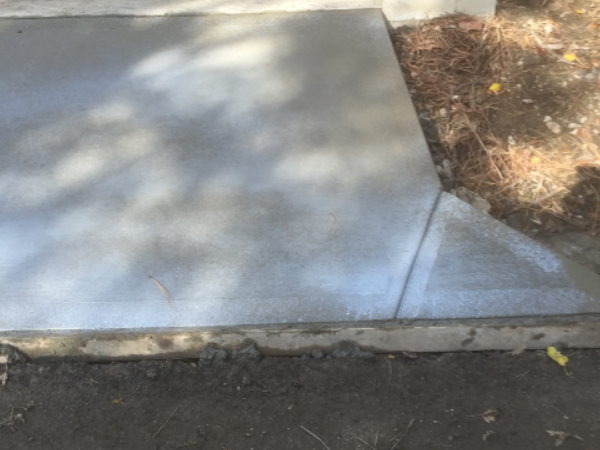 ODC Construction installs concrete ODC Construction concrete driveway apron off garage area