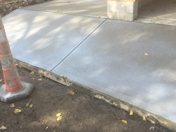 ODC Construction installs concrete Concrete side area and driveway apron installation by ODC Construction