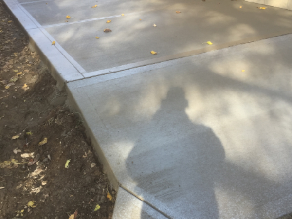 ODC Construction installs concrete New concrete driveway apron and side area by ODC Construction