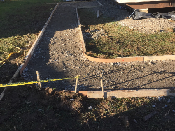ODC Construction installs concrete pathway ODC Construction installs concrete pathway sidewalk for mobile home