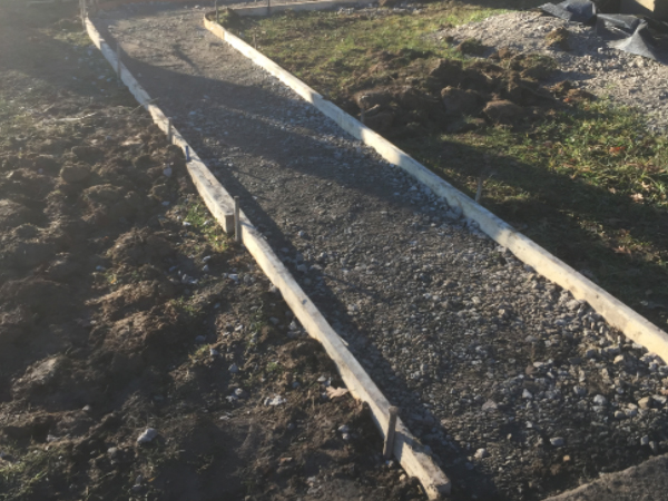 ODC Construction installs concrete pathway ODC Construction concrete pathway project for mobile home entrance