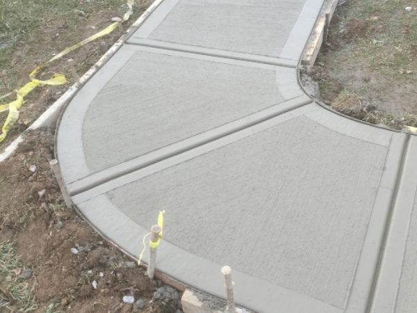 ODC Construction installs concrete pathway Mobile home concrete sidewalk installation by ODC Construction